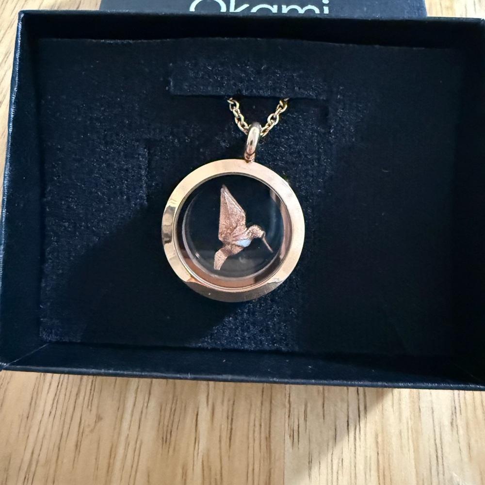 Gold Pendant Necklace with Bird Design